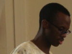 Ife Ademowo reads the lesson 